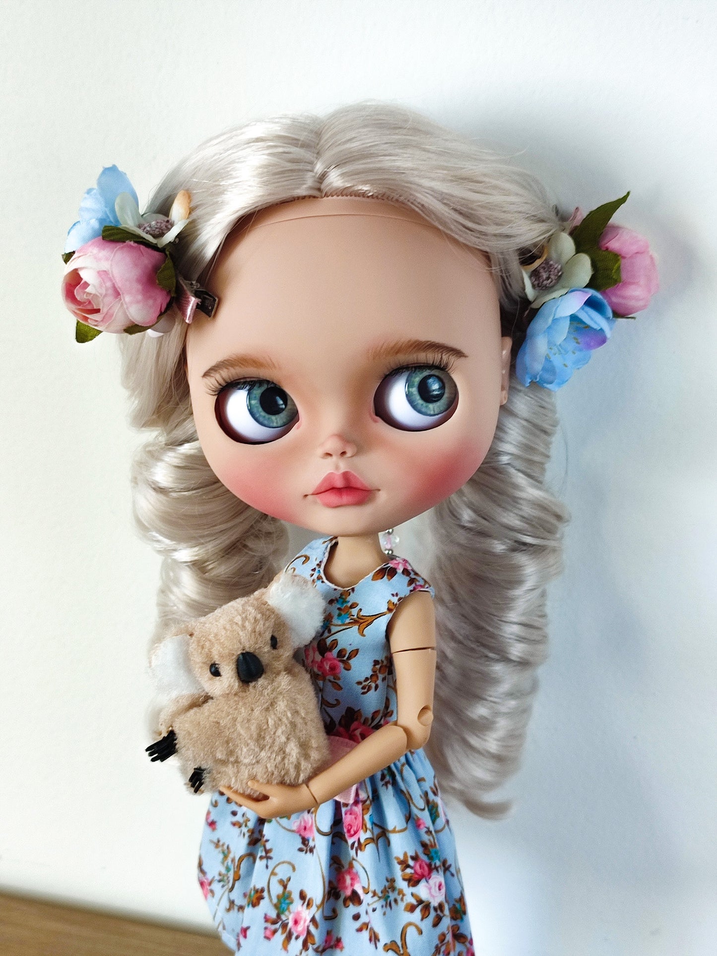 Custom blythe doll with blonde wavy hair in blue dress